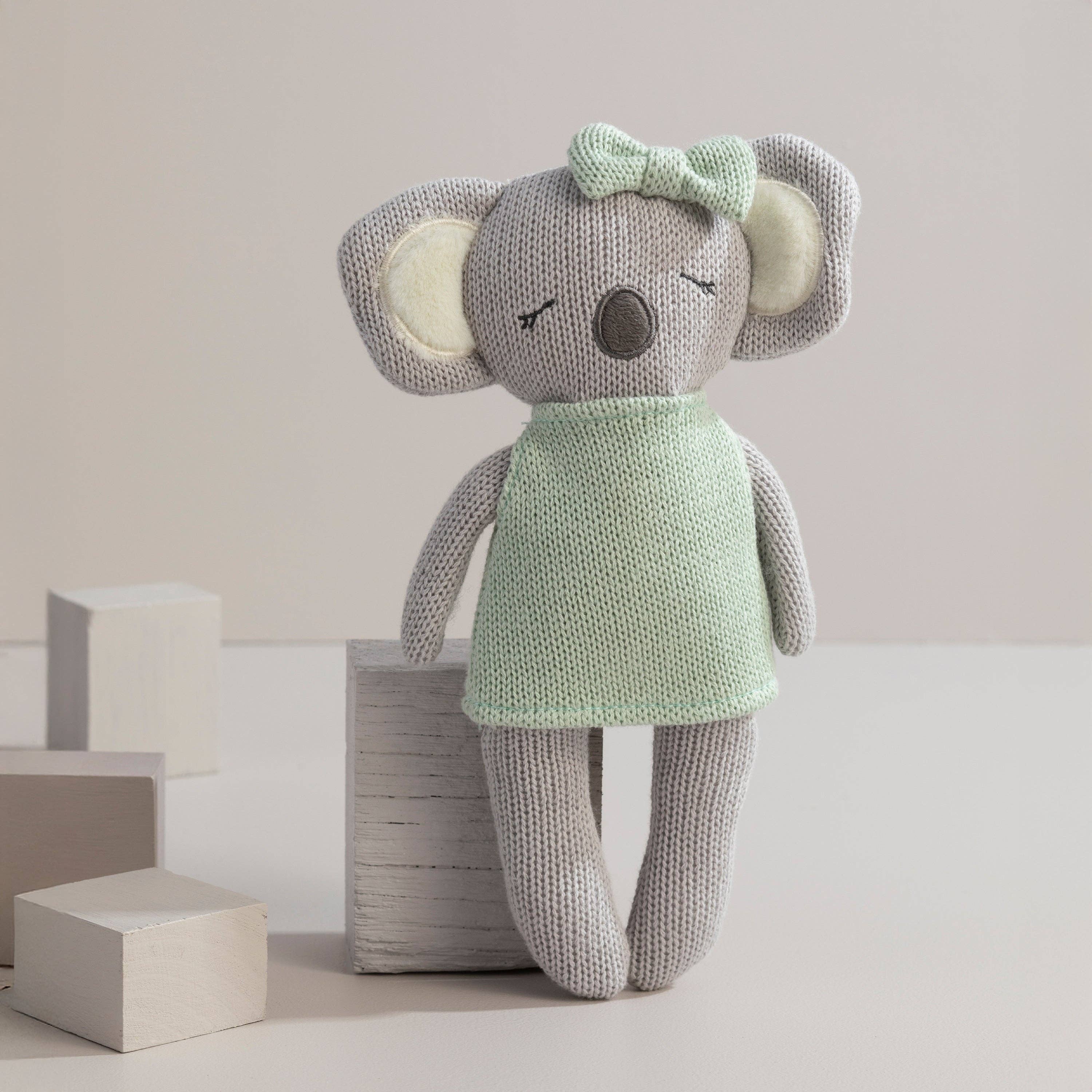 Living Textiles Kimmy the Koala knitted animal toy, soft plush toy with detailed knitted features, ideal for children and cuddly play.
