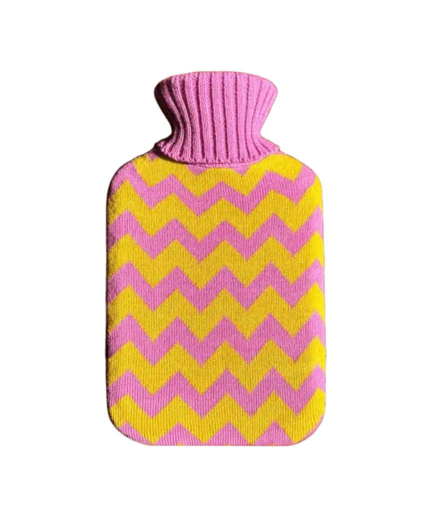 Casa Rolio hot water bottle with candy-colored cover, soft fabric design, and rounded shape for cozy warmth.