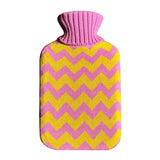 Casa Rolio hot water bottle with candy-colored cover, soft fabric design, and rounded shape for cozy warmth.