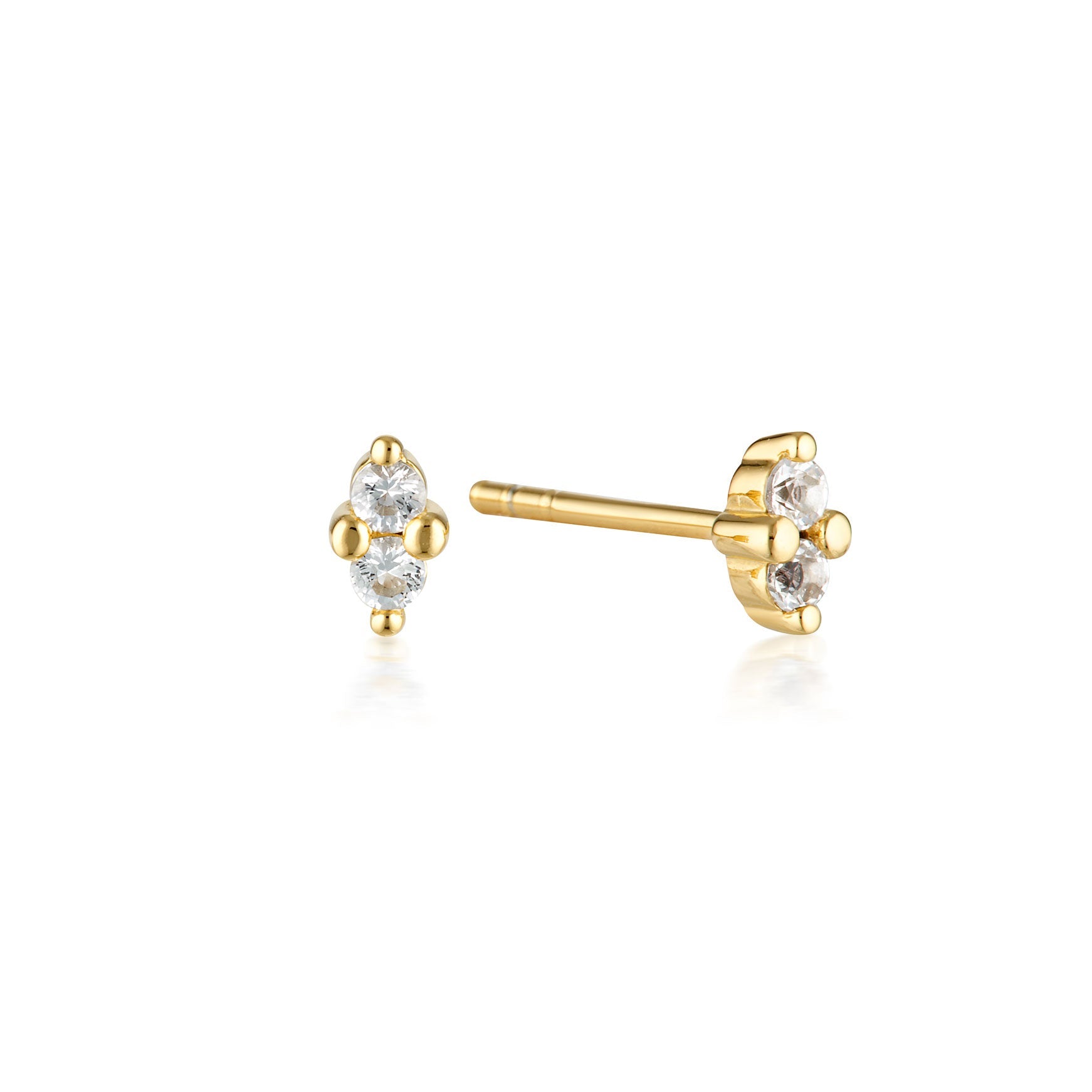 Linda Tahija April birthstone stud earrings featuring white topaz in gold setting, elegant and minimalist jewelry accessory.