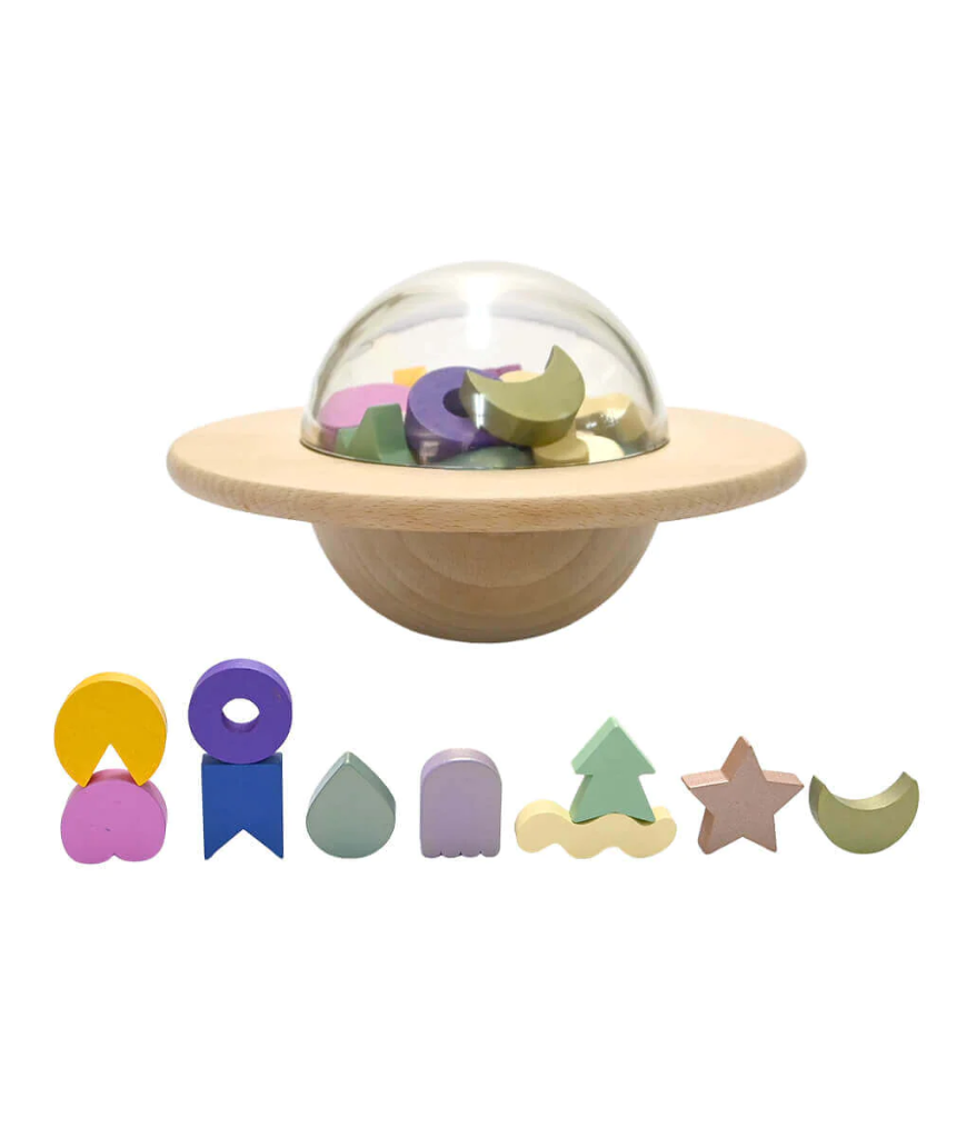 Kids playing the UFO Balance Game by Axis Toys, featuring colorful plastic pieces on a game board for balance challenges.