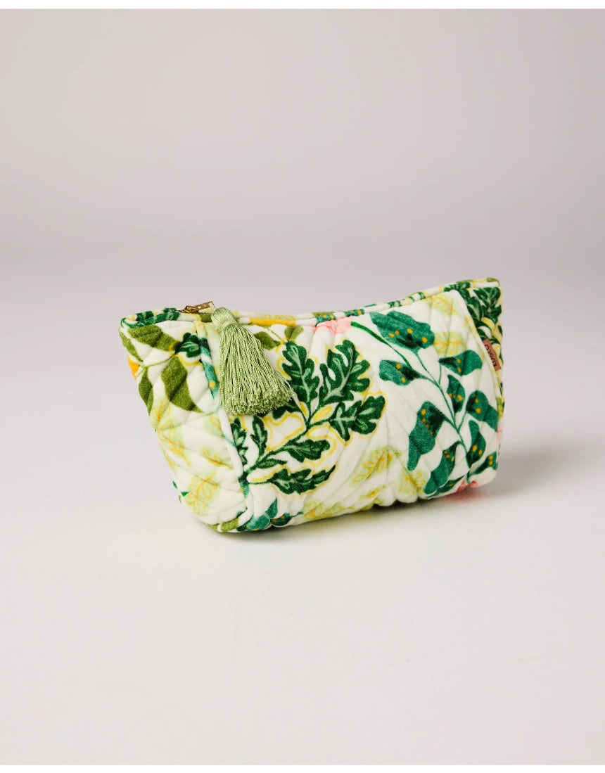 Kip & Co Wander Velvet Toiletry Bag in vibrant patterned velvet, compact travel accessory with zipper closure and soft interior.