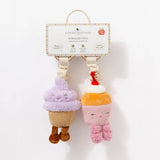 Living Textiles stroller toys featuring plush ice cream and cupcake designs, colorful and soft for baby play and comfort.