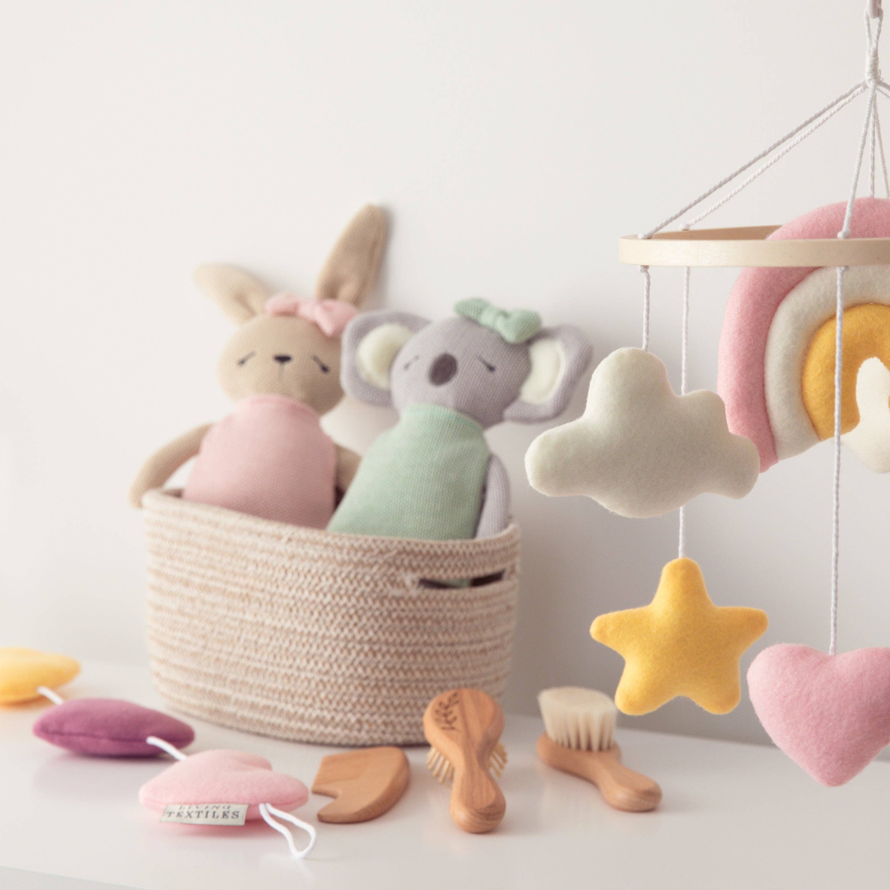 Living Textiles knitted animal toy featuring Kimmy the Koala, soft plush with detailed knitted features and adorable expression.