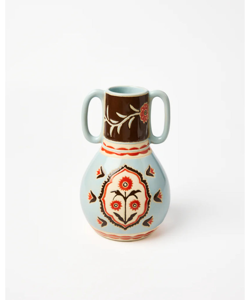 Jones & Co Samira vase with colorful floral arrangement, showcasing decorative ceramic design and vibrant flower display.