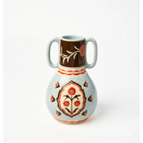 Jones & Co Samira vase with colorful floral arrangement, showcasing decorative ceramic design and vibrant flower display.