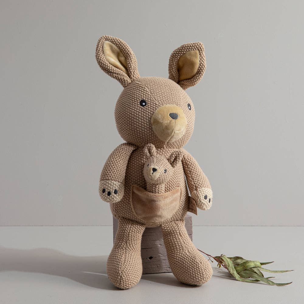 Living Textiles knitted toy of Kylie the Kangaroo, soft plush kangaroo with detailed knitting, suitable for children.