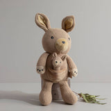 Living Textiles knitted toy of Kylie the Kangaroo, soft plush kangaroo with detailed knitting, suitable for children.