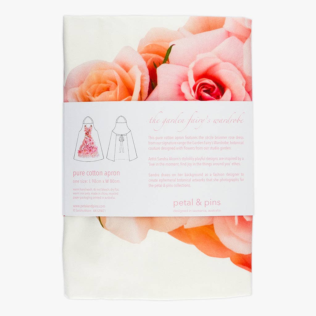 Petal & Pins floral apron featuring a Cécile Brünner Rose design with vibrant, detailed rose patterns on the fabric.