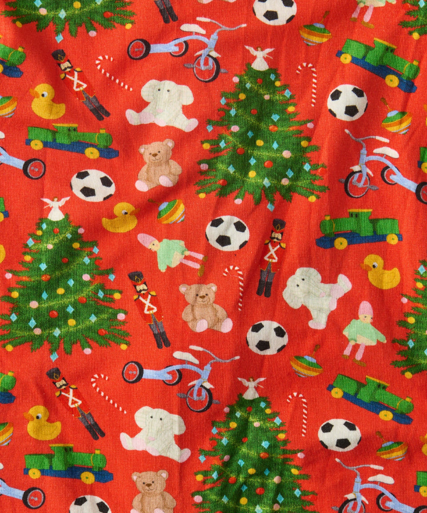 Kip & Co Christmas Toys baby romper with short sleeves, colorful festive print, soft cotton fabric, perfect for holiday wear.