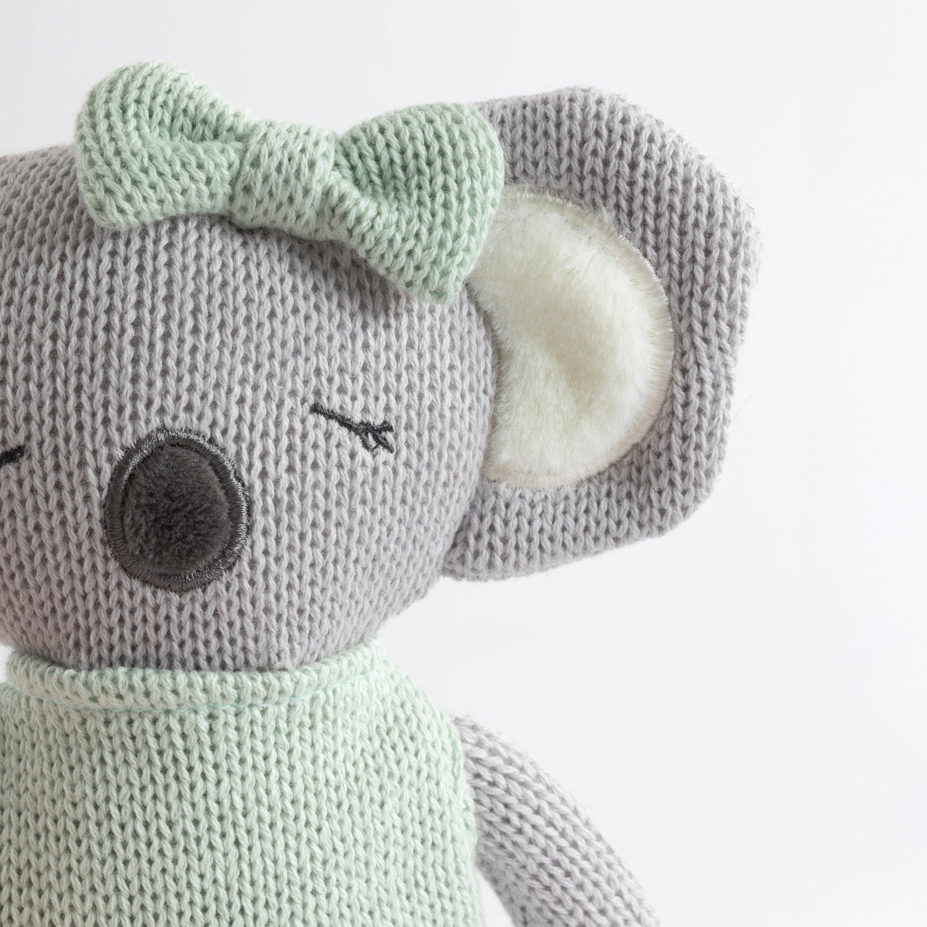 Living Textiles Kimmy the Koala knitted animal toy, soft plush koala with detailed stitching and adorable features for children.