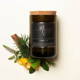 Mojo Candle Co. Barber Shop Black Label candle in a sleek black container, featuring a barber-themed label and a cozy, inviting glow.