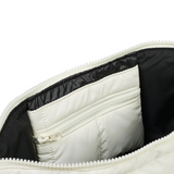 Ecru Base Cloud Stash Crossbody bag with adjustable strap and minimalist design, made of soft fabric for everyday use.