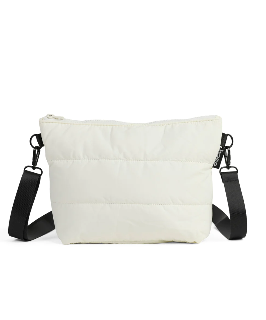 Ecru Crossbody Bag by Base with Cloud Stash design, featuring a sleek, compact style and adjustable strap for everyday use.