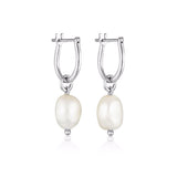 Linda Tahija Baroque Pearl Hoop Earrings made of sterling silver featuring elegant, round baroque pearls.
