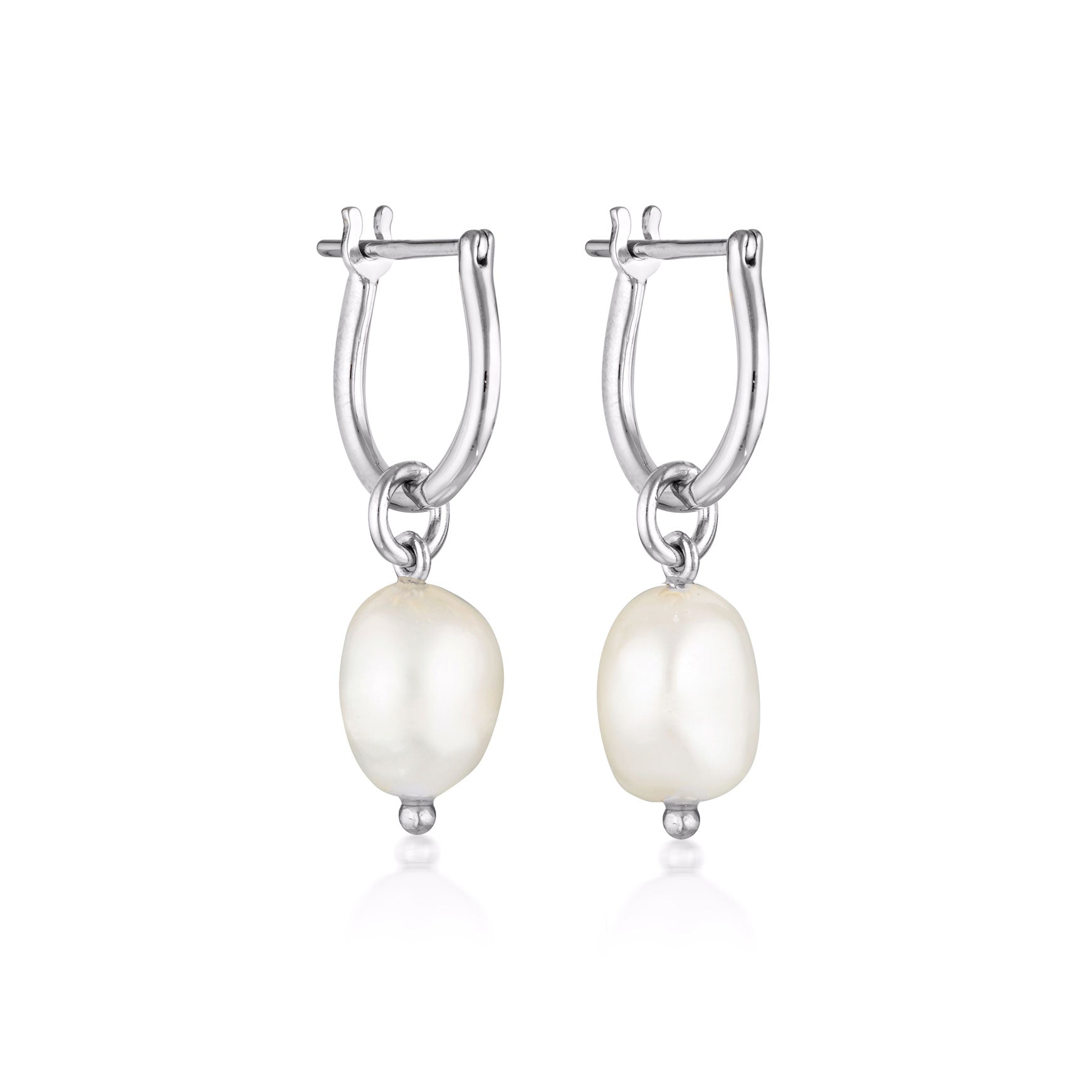 Linda Tahija Baroque Pearl Hoop Earrings made of sterling silver featuring elegant, round baroque pearls.