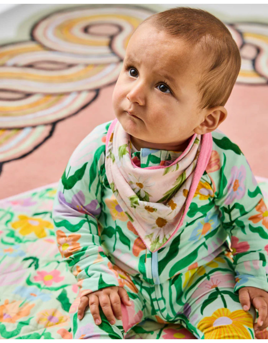 Kip & Co Sweet Flowers dribble bib set with colorful floral patterns, soft fabric, and adjustable snap closures for babies.