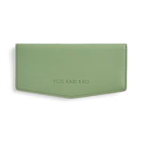Fox & Leo The Swallet in sage, a stylish bag with textured fabric and adjustable strap, displayed on a neutral background.