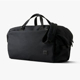 Black Bellroy Classic Duffel 35L bag with sturdy handles and spacious main compartment, suitable for travel and weekend trips.