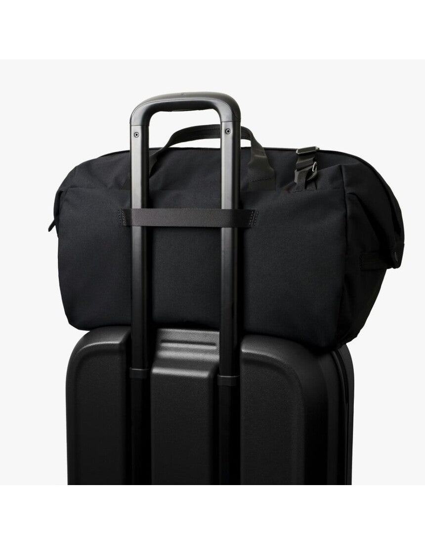 Bellroy Classic Duffel 35L in black, made of durable material, showing its spacious design and sturdy handles for travel.