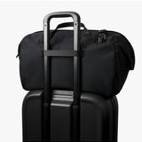 Bellroy Classic Duffel 35L in black, made of durable material, showing its spacious design and sturdy handles for travel.