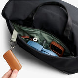 Black Bellroy Classic Duffel 35L bag with sturdy handles and sleek design for travel and daily use.