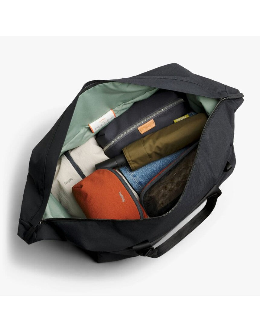 Black Bellroy Classic Duffel 35L bag with sturdy handles and spacious main compartment, designed for travel and daily use.