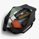 Black Bellroy Classic Duffel 35L bag with sturdy handles and spacious main compartment, designed for travel and daily use.