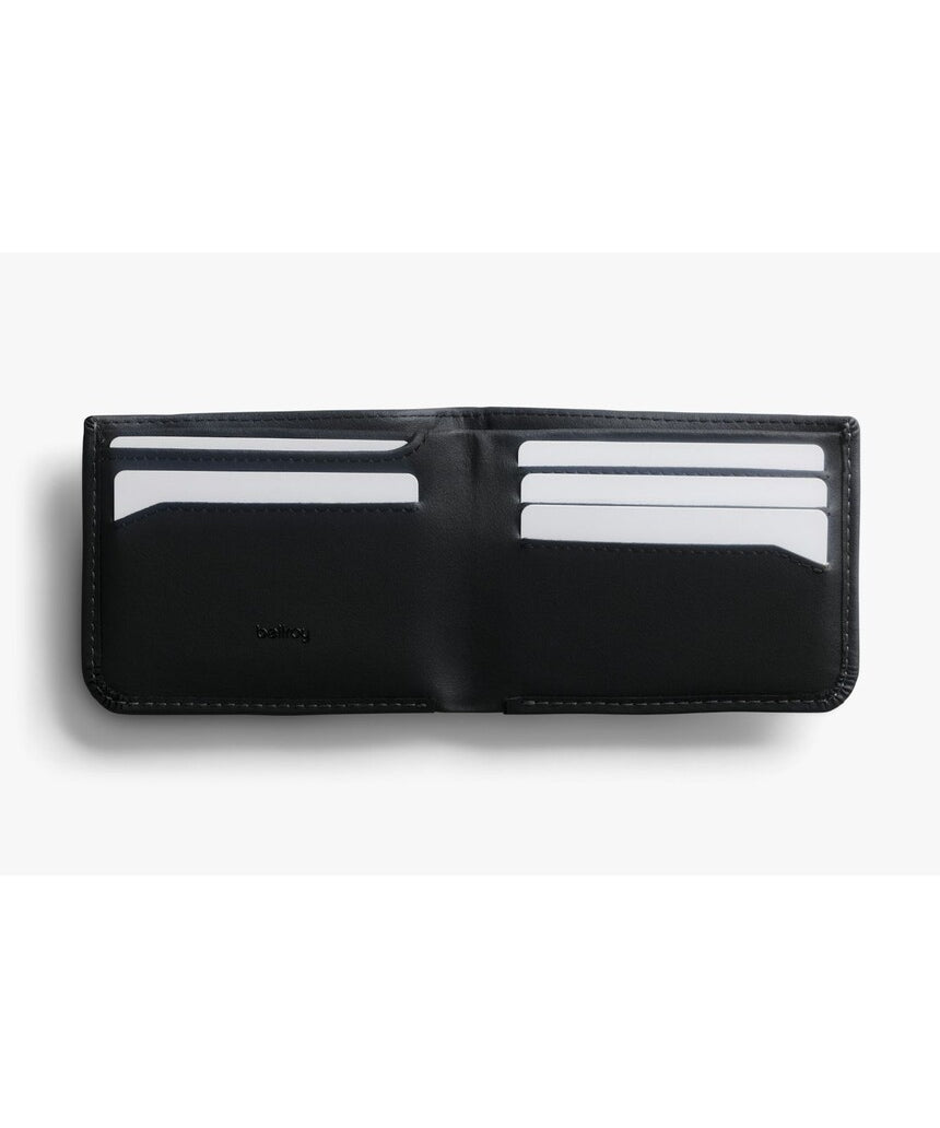 Bellroy Hide & Seek LO INNOVERA™ Edition black wallet with sleek design and multiple card slots, laid flat on a white background.