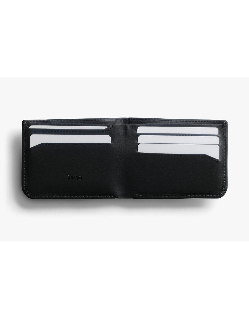 Bellroy Hide & Seek LO INNOVERA™ Edition black wallet with sleek design and multiple card slots, laid flat on a white background.