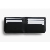 Bellroy Hide & Seek LO INNOVERA™ Edition black wallet with sleek design and multiple card slots, laid flat on a white background.