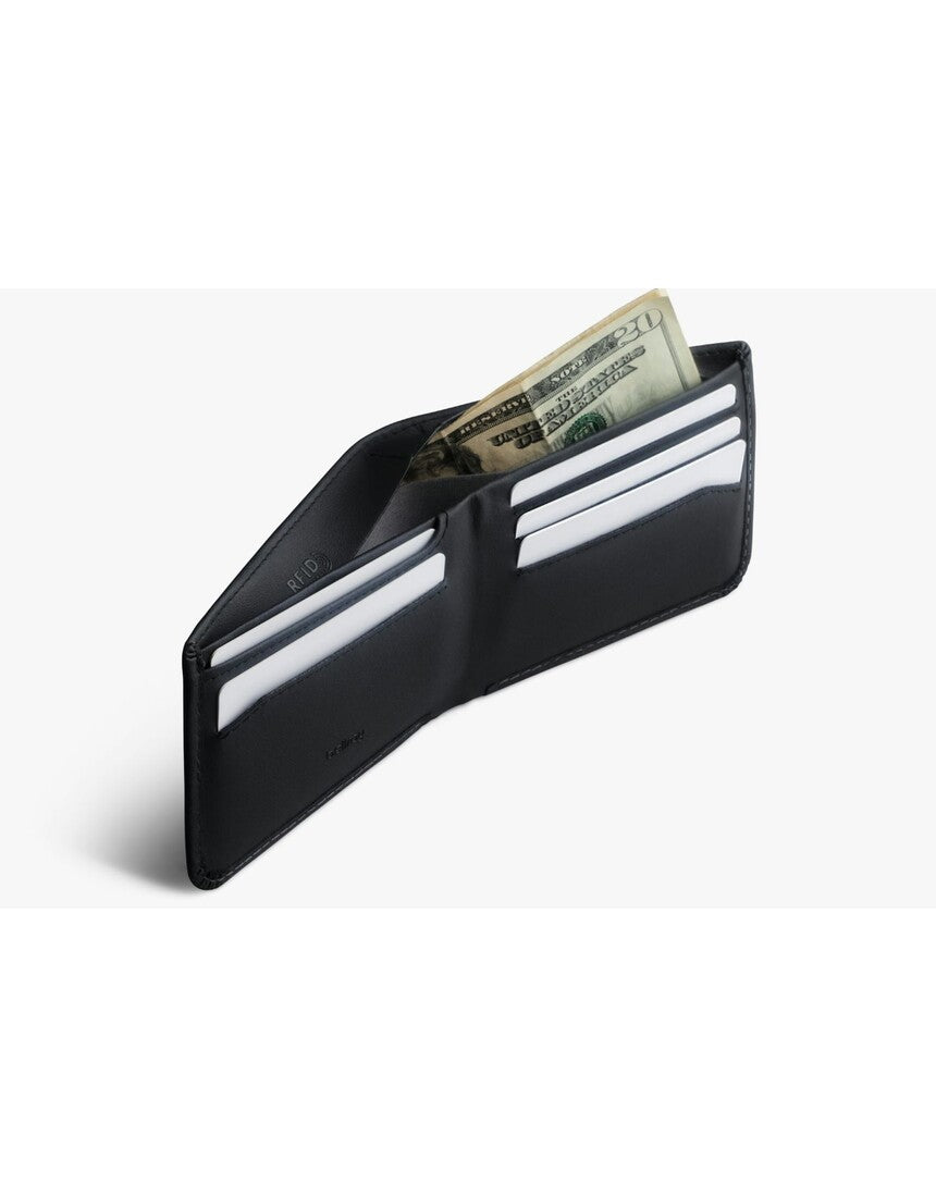 Black Bellroy Hide & Seek LO INNOVERA™ Edition wallet with sleek design and multiple card slots, displayed on a neutral background.