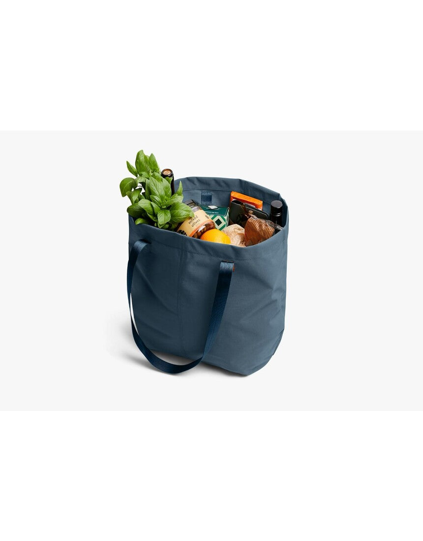 Bellroy Market Tote in Blue Steel with sturdy handles and spacious interior, perfect for daily use and shopping.