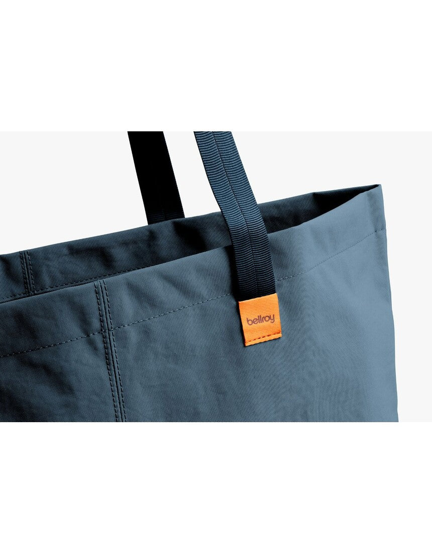 Bellroy Market Tote in Blue Steel, showing a stylish, spacious tote bag with leather handles and minimalist design.