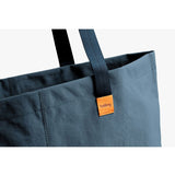 Bellroy Market Tote in Blue Steel, showing a stylish, spacious tote bag with leather handles and minimalist design.