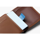 Bellroy Note Sleeve wallet in Hazelnut leather showing card slots and sleek design on a neutral background.