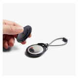 Bellroy black AirTag case with sleek design, compact accessory holder for tracking devices.
