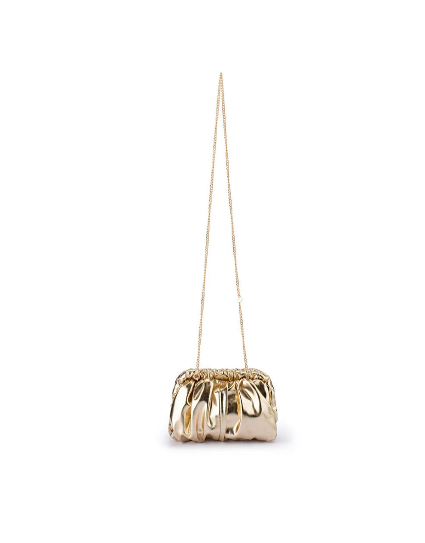 Olga Berg Betty Metallic Clutch in gold with a sleek, shiny finish, featuring a compact design and elegant clasp.