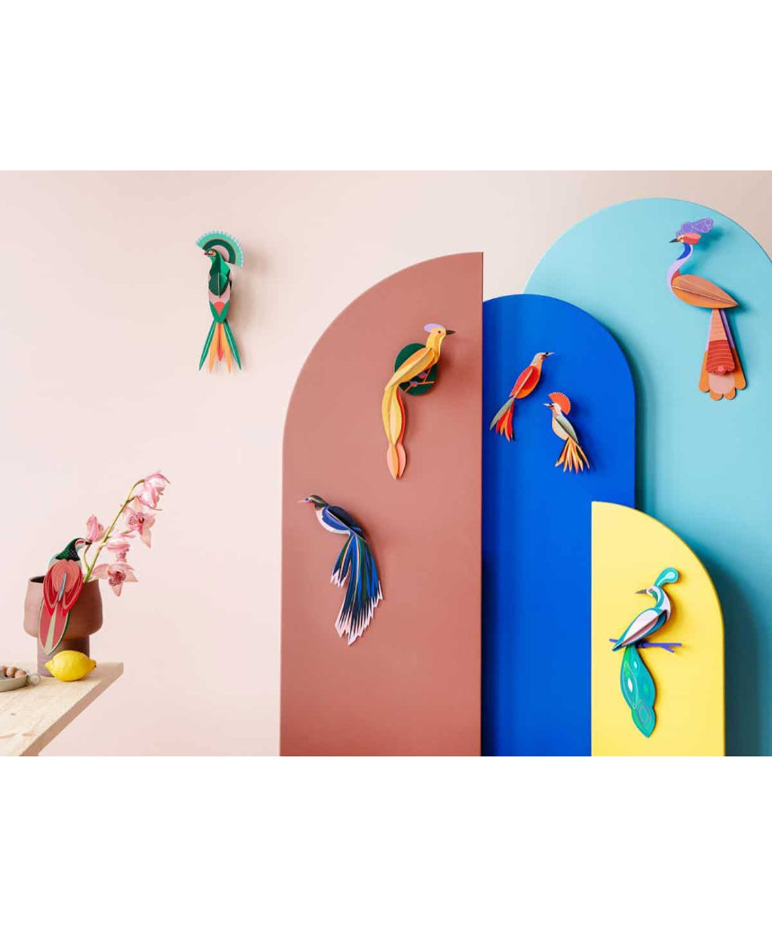 Studio Roof Wall Decor Flores B5 featuring a detailed illustration of birds flying over a scenic landscape.