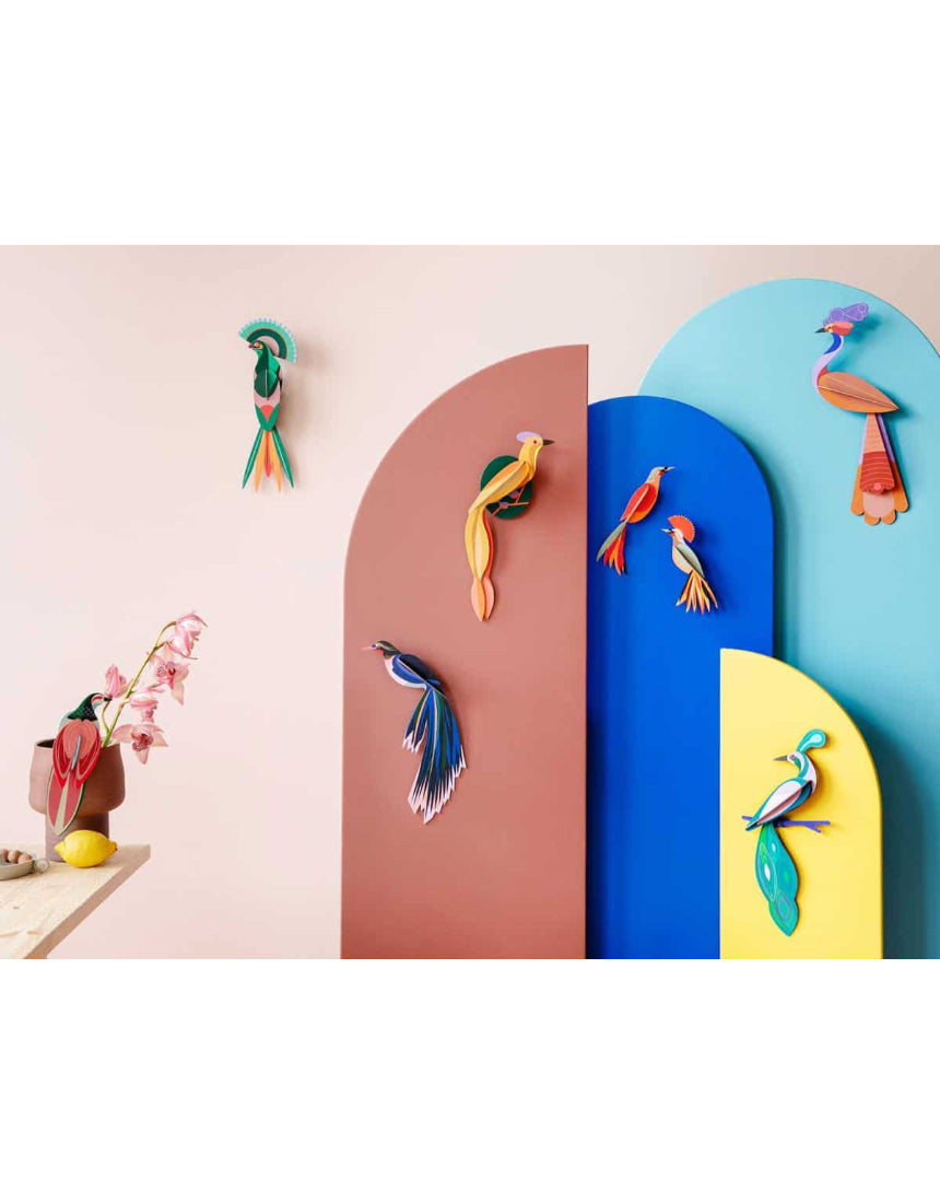 Studio Roof Wall Decor Flores B5 featuring a detailed illustration of birds flying over a scenic landscape.