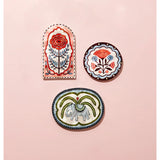 Jones & Co Samira Wall Art Flower Circle, vibrant floral wall decor showcasing colorful flower design on a circular background.