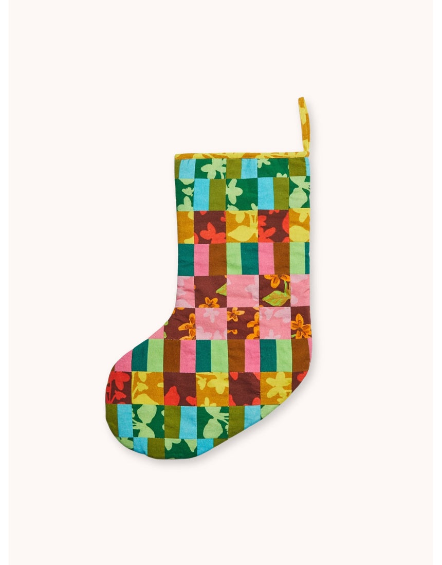 Bonnie and Neil patchwork Christmas stocking in colorful patterned fabric