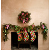 Bonnie and Neil patchwork Christmas stocking with colorful festive fabric panels and hanging loop