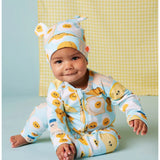 Baby wearing Halcyon Nights Brunch Buddies long sleeve zip suit with matching hat, featuring playful brunch-themed print.