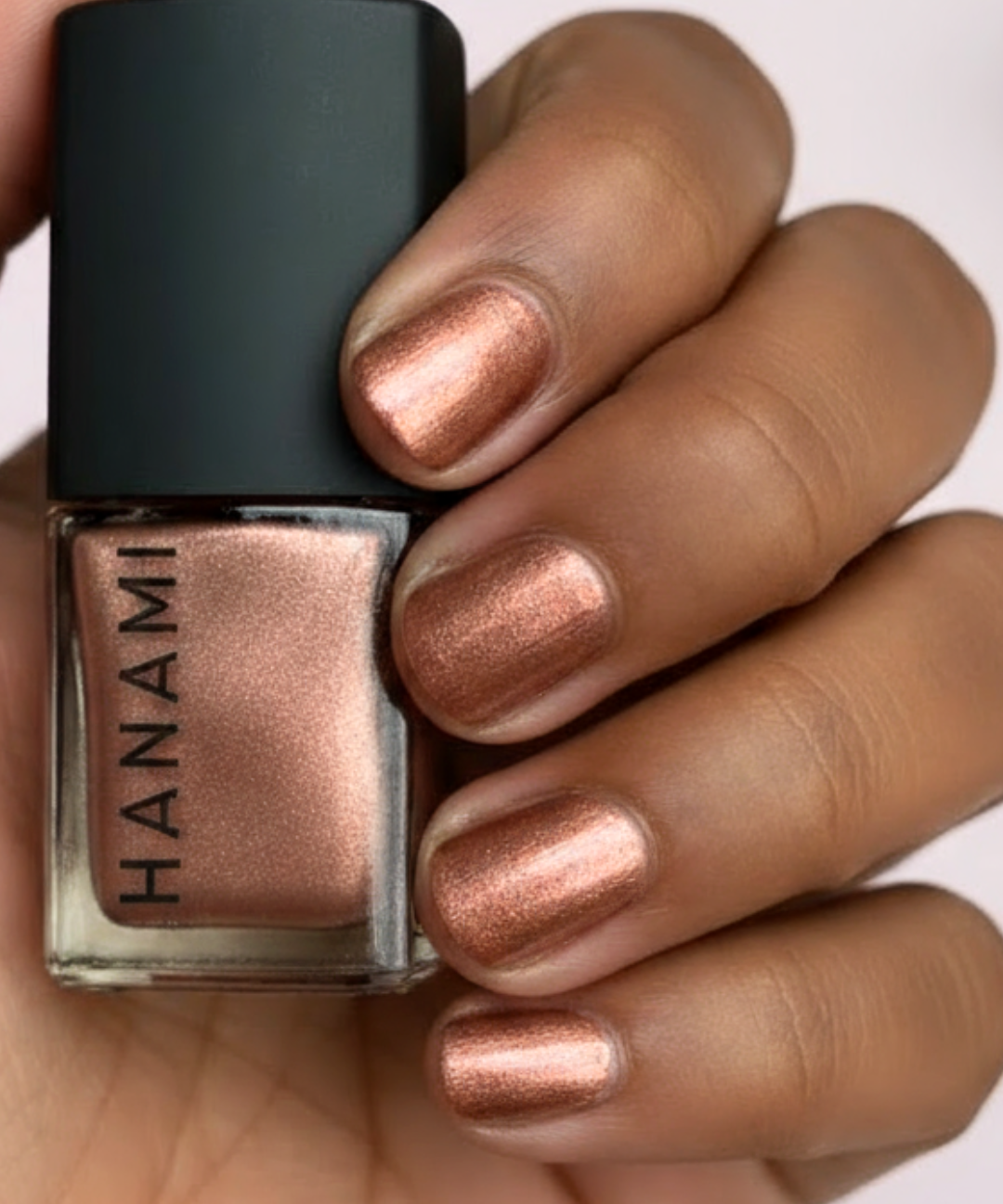 Hanami Cosmetics Rosewood Nail Polish in a rich, deep reddish-brown color with a smooth, glossy finish.