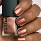 Hanami Cosmetics Rosewood Nail Polish in a rich, deep reddish-brown color with a smooth, glossy finish.