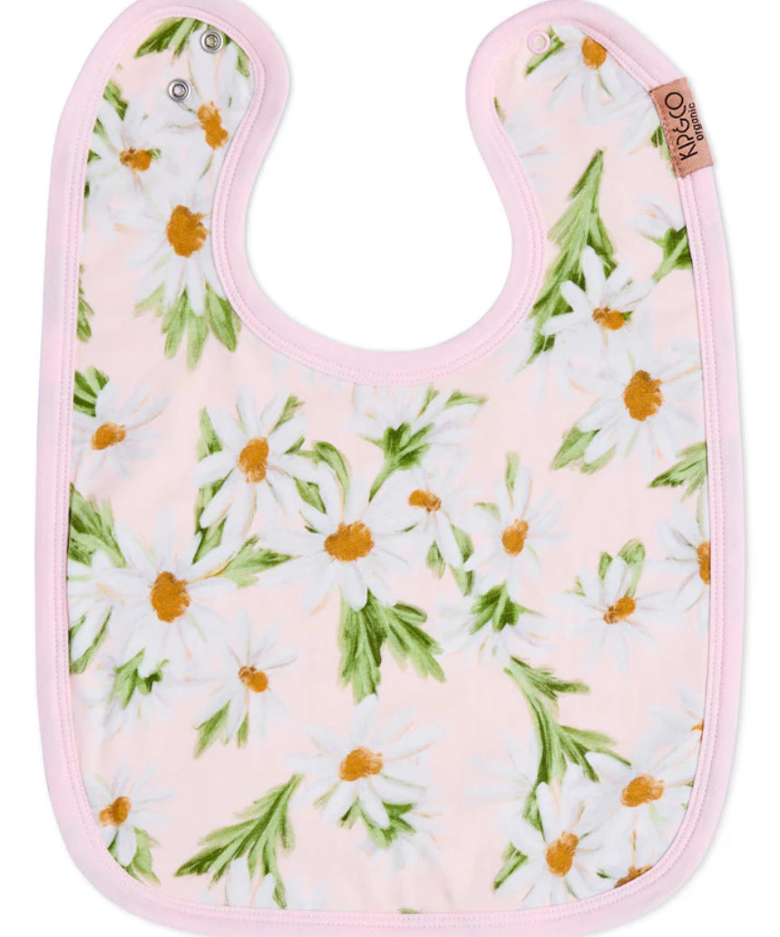 Kip & Co Sweet Daisy cotton baby bib with colorful floral design, soft fabric, and adjustable neck for comfortable feeding.