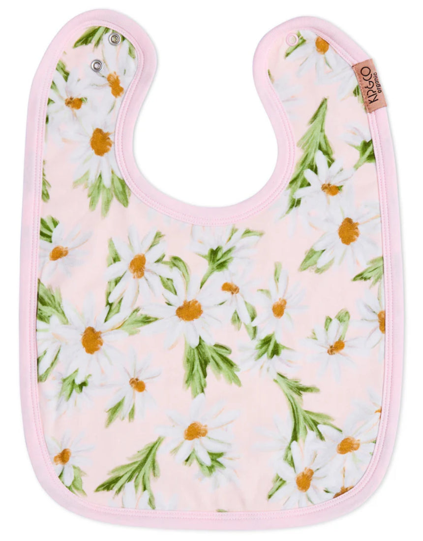 Kip & Co Sweet Daisy cotton baby bib with colorful floral design, soft fabric, and adjustable neck for comfortable feeding.