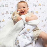 Living Textiles Jersey Sherpa Blanket featuring a tractor ride pattern, soft fabric with cozy texture, perfect for children’s bedding or nursery.