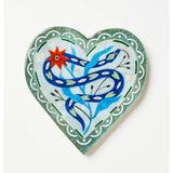 Jones & Co Fable Snake Blue Heart wall decor featuring a decorative snake shape with blue heart accents on a neutral background.